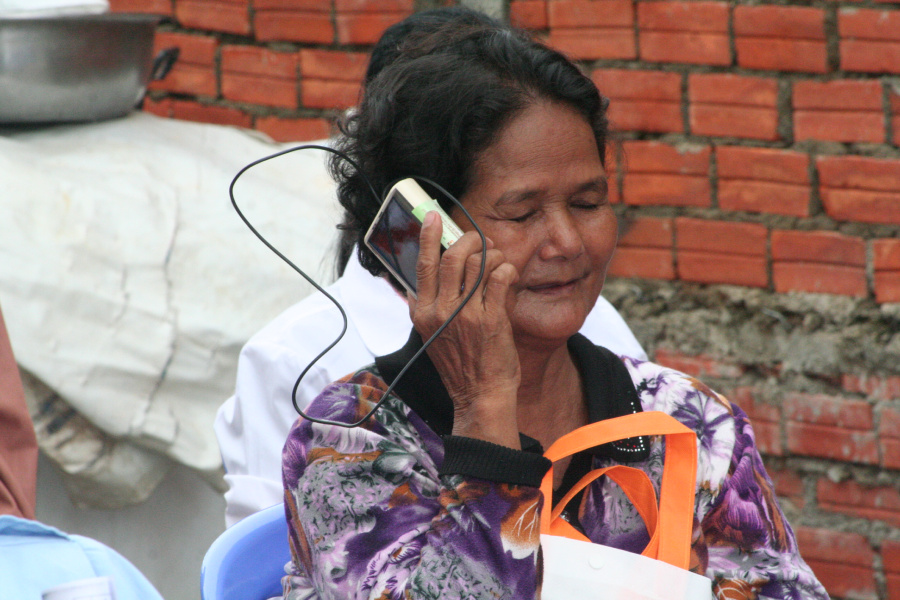 Lady listening to the radio